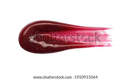 Smudged red lip gloss sample isolated on white background