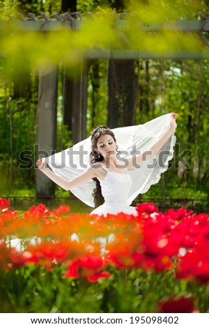 Bride with flowers outdoors