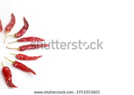 Dried red chilli on white background