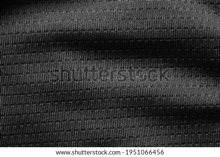 Black sport cloth fabric football shirt jersey texture close up