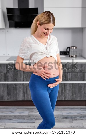 Cute Pregnant Female Look At Belly Tummy WIth Love, Stroking