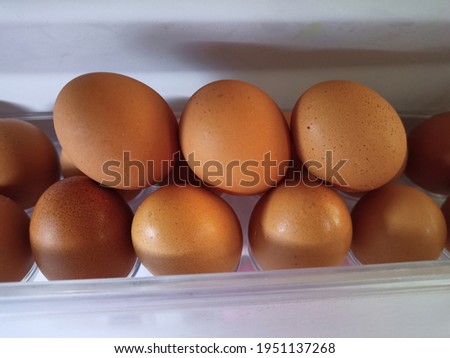 chicken eggs on the refrigerator door