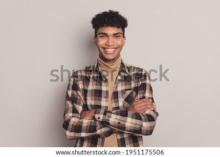 Photo of confident guy crossed hands beaming smile wear plaid shirt turtleneck isolated grey color background