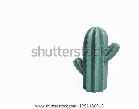 cactus, a porcelain figurine of a cactus isolated on a white background.