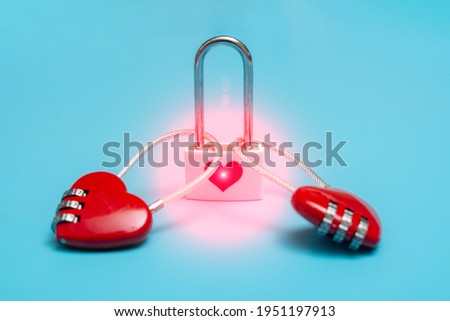 Love affection, attraction, connection. Two hearts in the form of locks on a blue background. Love ties.