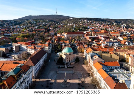 Aerial photo about the Szechenyi square in Pecs city Hungary. Amazing view with the downtown's church what name is Dzsami. Royalty-Free Stock Photo #1951205365