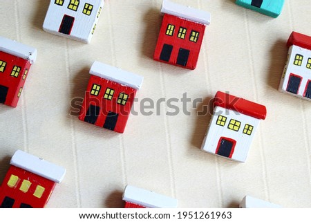 Cute background with toy wooden Scandinavian houses