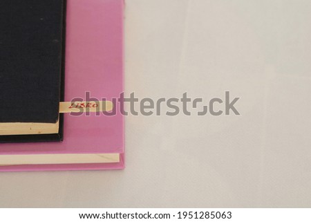 Bookmark in a book on a white background