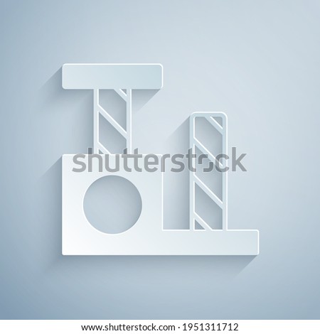 Paper cut Cat scratching post with toy icon isolated on grey background. Paper art style. Vector
