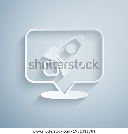 Paper cut Rocket ship icon isolated on grey background. Space travel. Paper art style. Vector