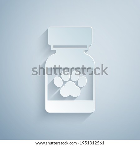 Paper cut Medicine bottle and pills icon isolated on grey background. Container with pills. Prescription medicine for animal. Paper art style. Vector