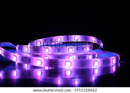 Led strip in operation generates suggestive luminous and colored effects
