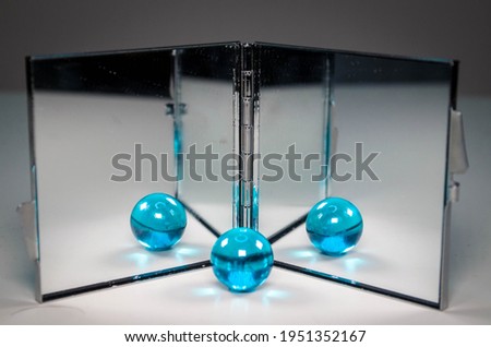 white hearts, ring, glass ball and mirror