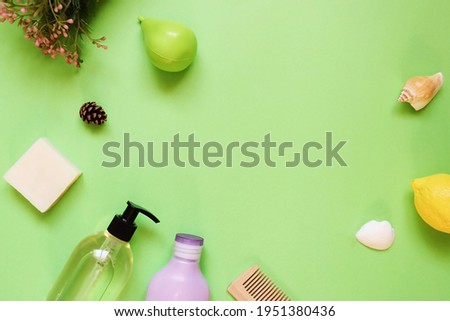 Natural spa organic cosmetic products on a green background. Flat lay beauty mockup, top view photography