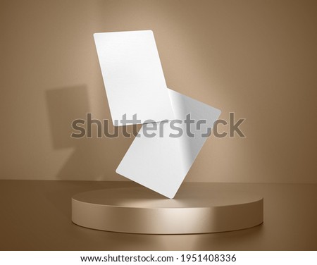 Plain White Two Vertical Business Cards On Golden Background
