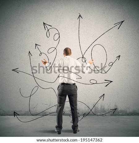 Concept of confused choice of a businessman with arrows