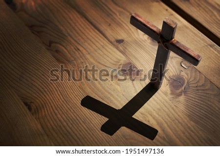 Wooden cross. Concept Jesus loves you.Easter time.