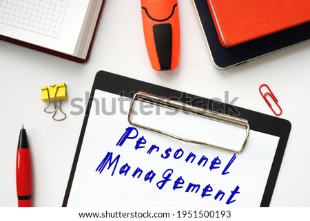 Financial concept about Personnel Management with sign on the sheet. 
