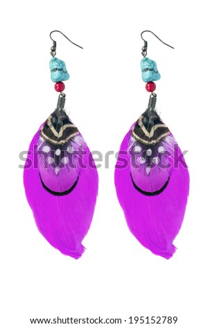 Ethnic earrings with purple feathers isolated over white