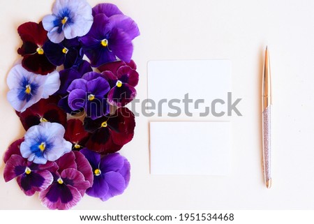 Pansy flowers styled stock scene, for wedding invitation, product showcase or styled presentation with copy space, top view