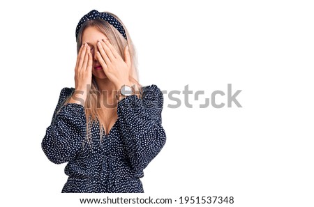Young beautiful blonde woman wearing casual clothes rubbing eyes for fatigue and headache, sleepy and tired expression. vision problem 