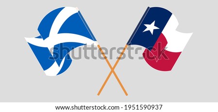 Crossed and waving flags of Scotland and the State of Texas