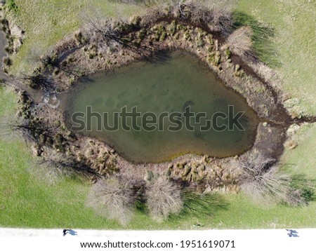Aerial view of a natural park with water springs