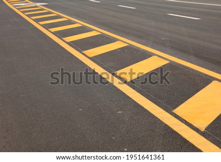newly street asphalt road, Asphalt road as abstract background, yellow line on the road texture.
