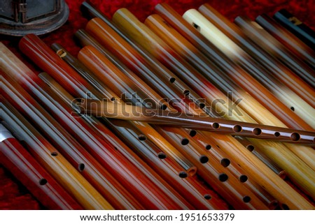 Balkan wooden hand made musical instrument flute  Royalty-Free Stock Photo #1951653379