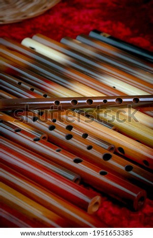 Balkan wooden hand made musical instrument flute  Royalty-Free Stock Photo #1951653385
