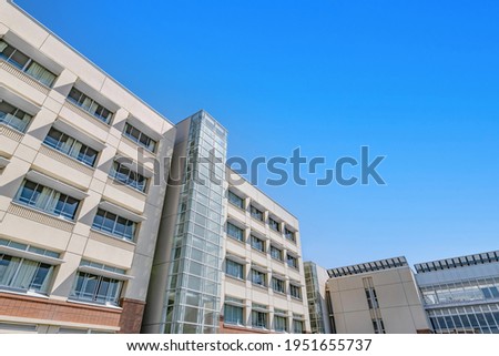 School building and spring blue sky Royalty-Free Stock Photo #1951655737