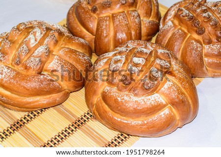 Braided rolls of Challah festive bread. Challah is a special bread of Eastern European origin in Ashkenazi Jewish cuisine.