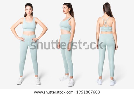 Woman in blue sports bra and leggings set Royalty-Free Stock Photo #1951807603