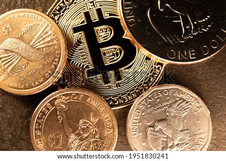 Dollar coins surrounding a Gold Bitcoin. Digital Crypto Currency with US Dollar Coins. Trading and Price of Crypto in USD