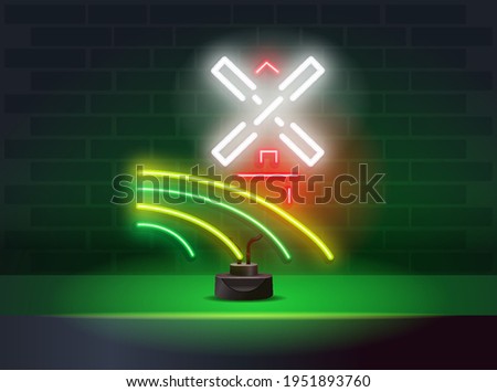 Neon windmill on the table in the interior. The concept of a bakery store and confectionery products. Night bright neon sign, colorful billboard, light banner. Vector illustration in neon style.