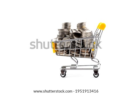 shopping cart with coins,shopping cart with coins isolated on white background,shopping cart,coins in shopping cart on the white background.