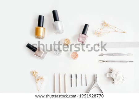 Tools of manicure set on white background.