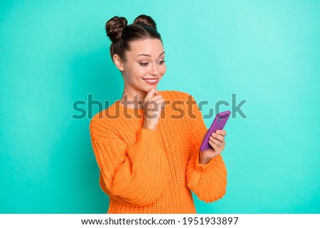 Photo of young beautiful pretty thoughtful minded girl blogger use smartphone thinking isolated on turquoise color background