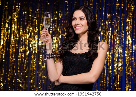 Photo of young cheerful girl happy positive smile celebration event champagne toast isolated over glitter color background