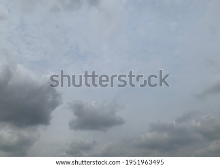Thunder cloud, Nimbostratus Clouds A gray Style rolls are round to each other ​and Huge scary storm it's going to rain heavily at Thailand.no focus