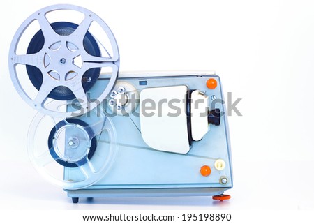 Old movie projector ; Old 8 mm home movie projector,isolated on white background,photography
