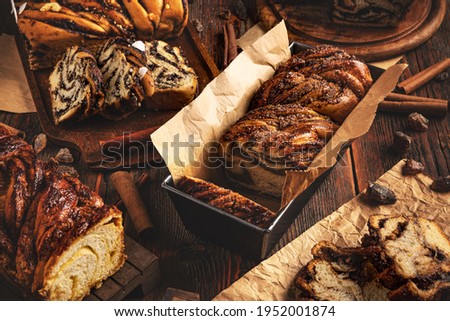 Babka sweet braided bread prepared with a yeast-leavened dough that is rolled out and spread with a filling