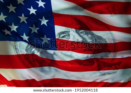 American financial system. American flag and us dollar. American currency. U.S. economy. World economy. Economy of different countries. Royalty-Free Stock Photo #1952004118