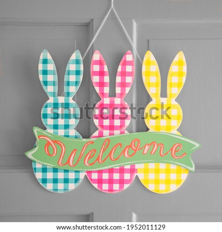 Easter Welcome Sign on a Dark Gray Door