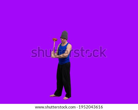 Man with glasses and plunger stands in a defenses manner with a purple background