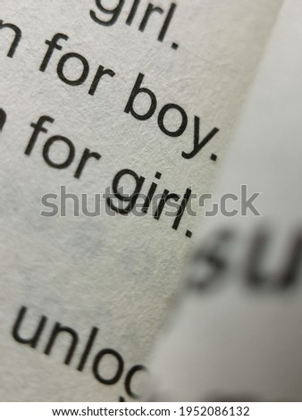 Extreme close-up portrait of texts inside of a book 