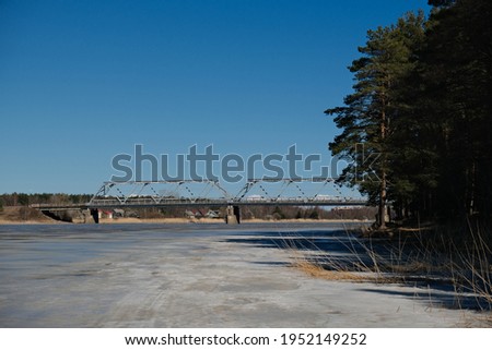 bridge over the Luga river. Ust-Luga is a port settlement in the Kingisepp district of the Leningrad region of Russia.