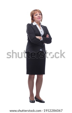 Senior businesswoman wearing black suit posing with crossed arms,