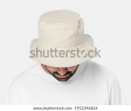 Man wearing bleached bucket hat, front view Royalty-Free Stock Photo #1952346826