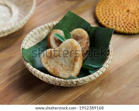 Wingko with love shape. Wingko is javanese traditional pancake made from grated coconut, gluotinous fluor and sugar. Selective focus